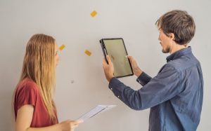 Image of landlord checking tenant damage.