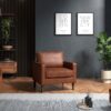 Tan armchair in a dark room