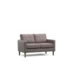 Grey two seater sofa in a dark room